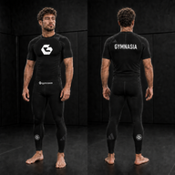 Adult wearing the branded Gymnasia short-sleeve rashguard with tights, front and back
