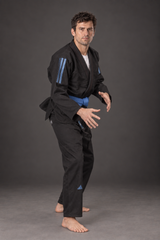 Adidas Contest 2.0 Tropical Leaf BJJ gi, black, modeled three-quarter side view; belt shown for styling