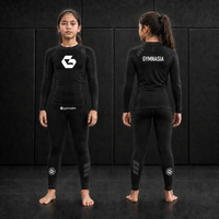 Girl wearing the branded Gymnasia long-sleeve No-Gi set, front and back
