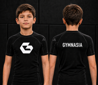Child wearing the branded Gymnasia short-sleeve rashguard, front and back