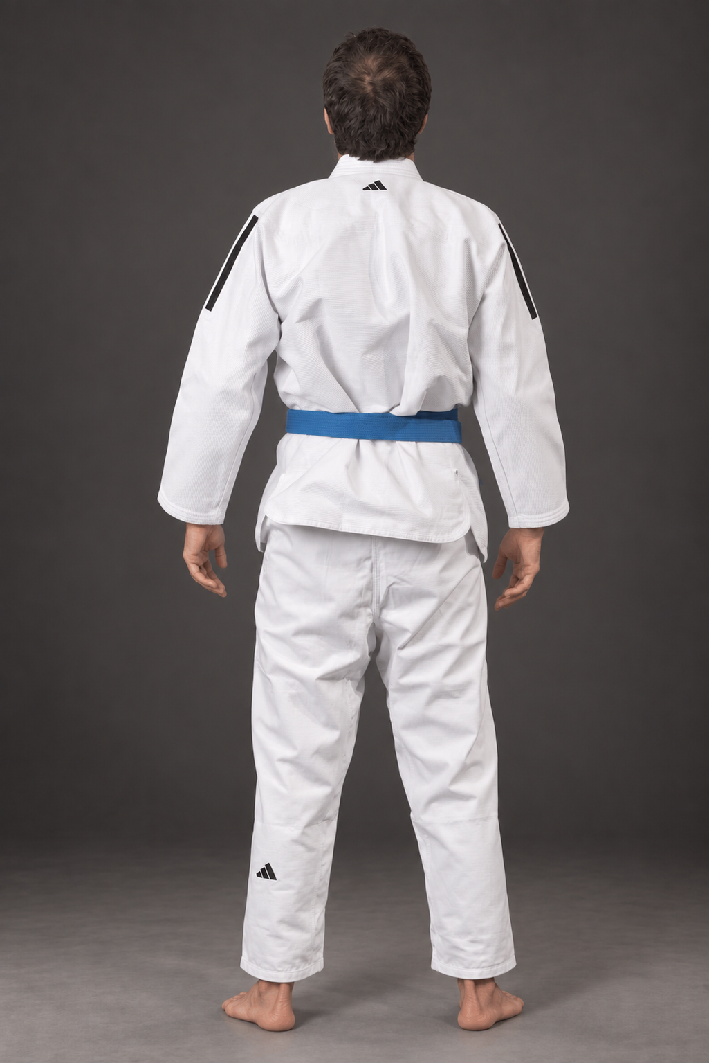 Adidas Contest 2.0 Tropical Leaf BJJ gi, white, modeled back view; belt shown for styling