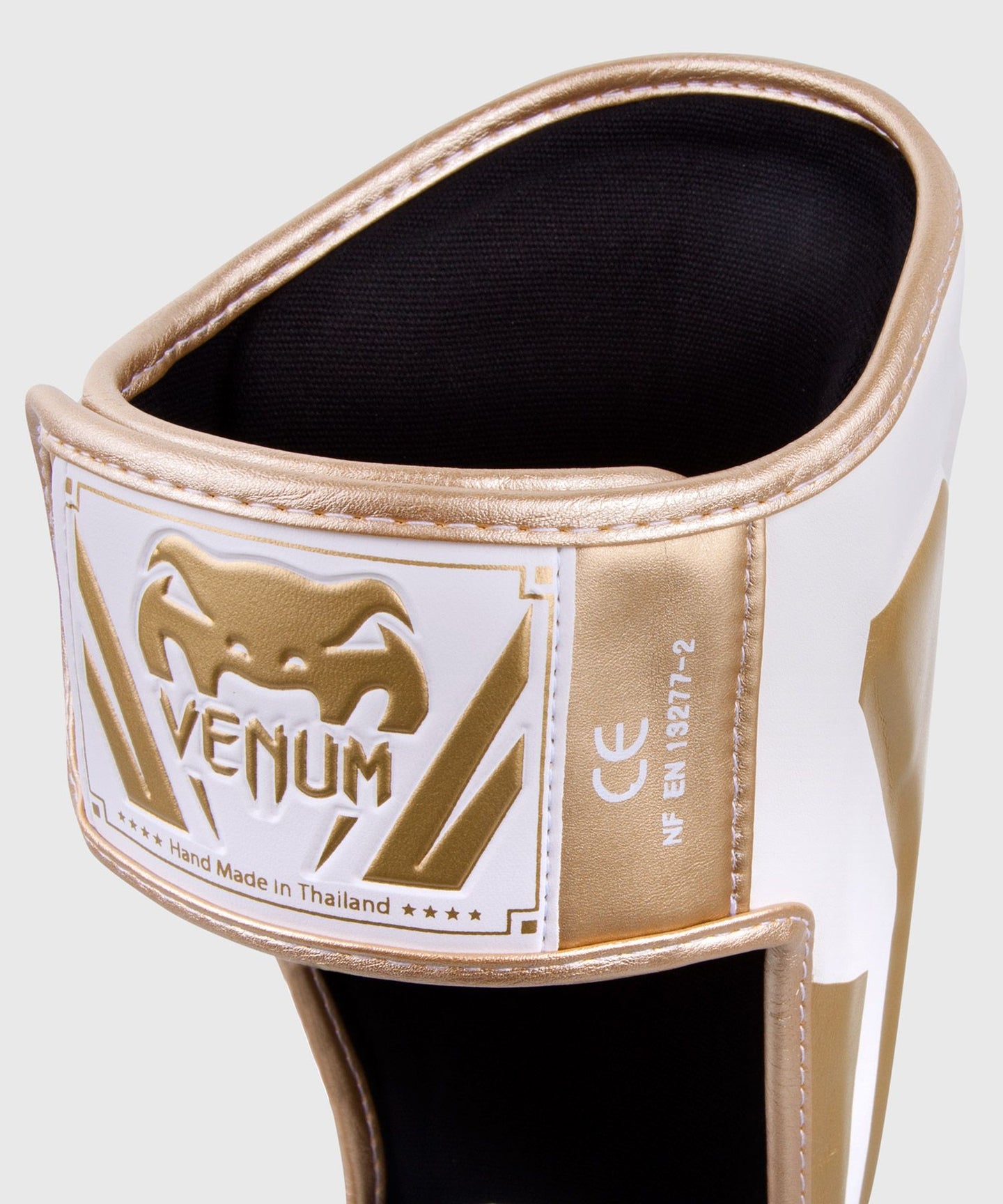 Venum Elite Shin Guards back view with velcro straps and heel support
