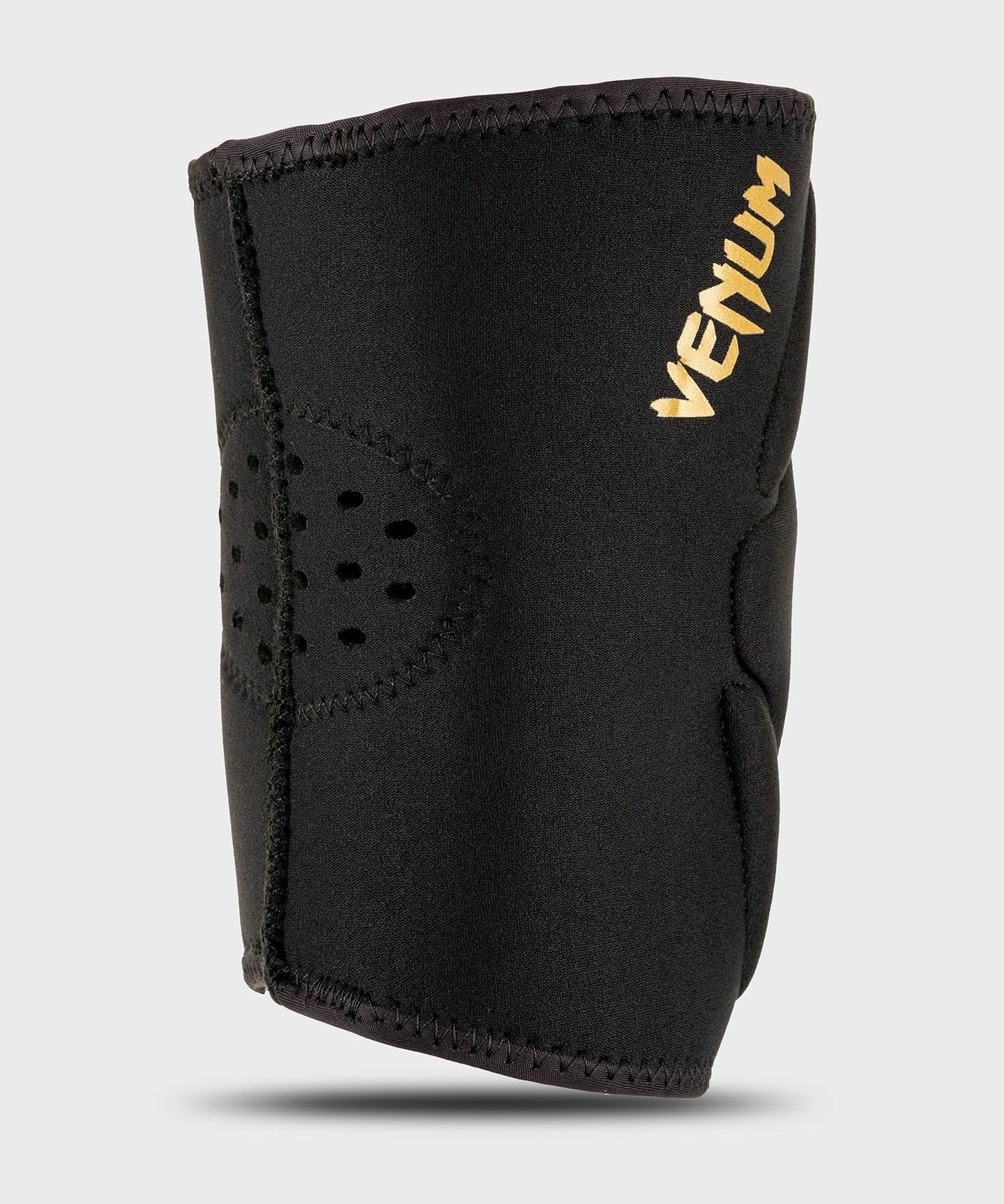 Venum Kontact Gel Knee Pad Black Gold side angle showing padding thickness