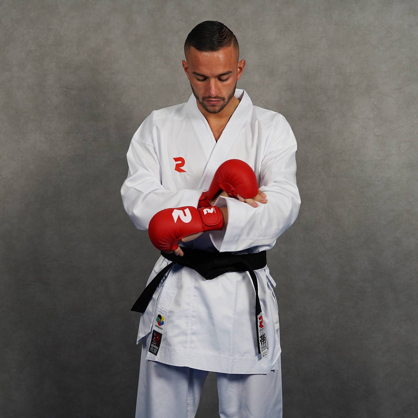Red karate mitts side profile showing padding thickness